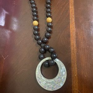 Wood necklace and mother of pearl pendant